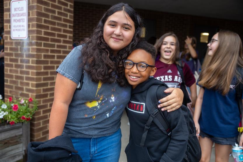 People smile on the first day of school